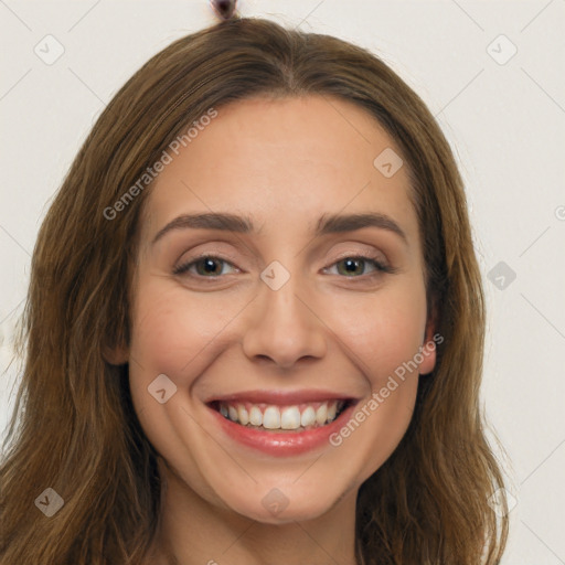 Joyful white young-adult female with long  brown hair and brown eyes