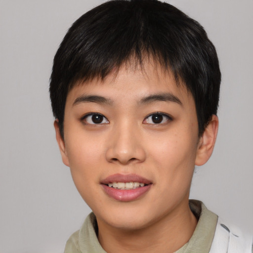 Joyful asian young-adult female with short  brown hair and brown eyes