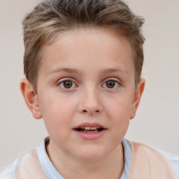 Joyful white child female with short  brown hair and brown eyes