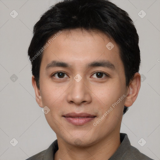 Joyful white young-adult male with short  black hair and brown eyes