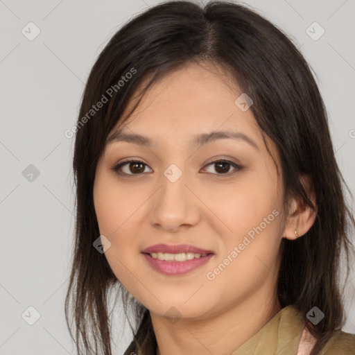 Joyful asian young-adult female with long  brown hair and brown eyes