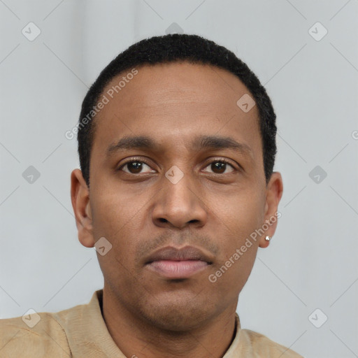 Neutral latino young-adult male with short  black hair and brown eyes