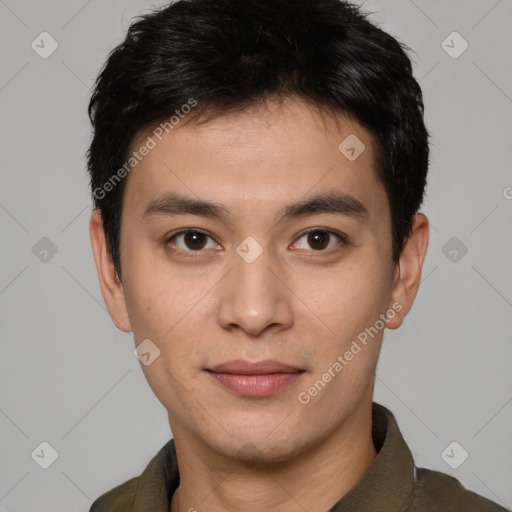 Joyful white young-adult male with short  black hair and brown eyes