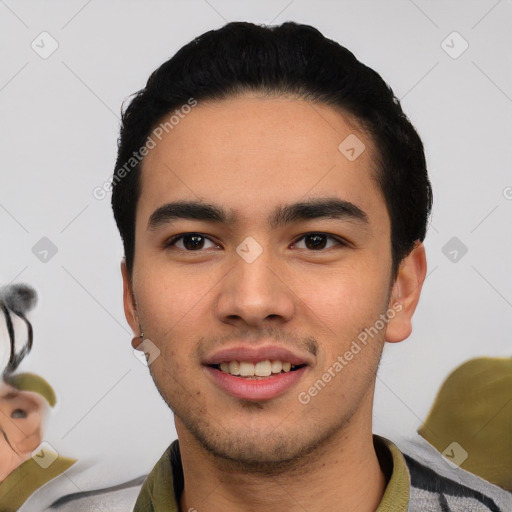 Joyful latino young-adult male with short  black hair and brown eyes