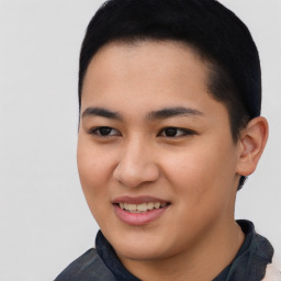 Joyful asian young-adult female with short  black hair and brown eyes