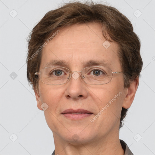 Joyful white adult female with short  brown hair and grey eyes