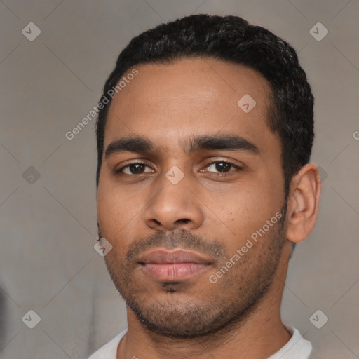 Neutral latino young-adult male with short  black hair and brown eyes