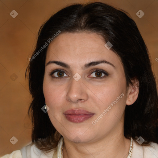 Joyful white adult female with medium  brown hair and brown eyes