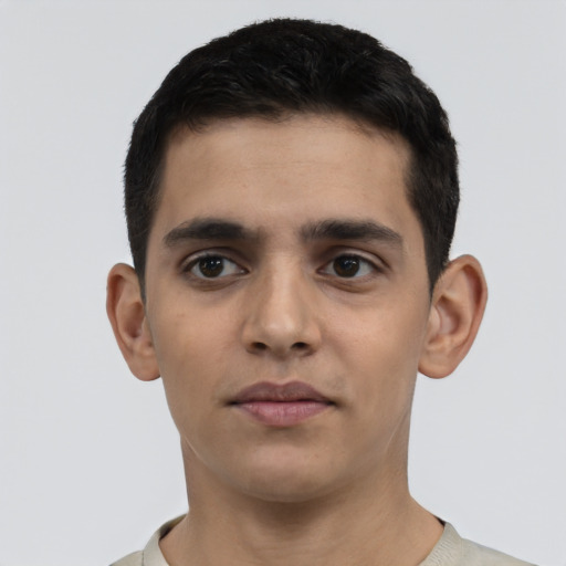 Neutral latino young-adult male with short  black hair and brown eyes