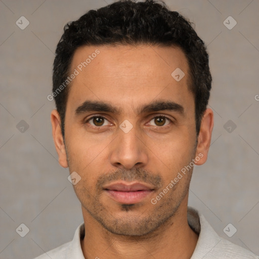 Neutral white young-adult male with short  black hair and brown eyes