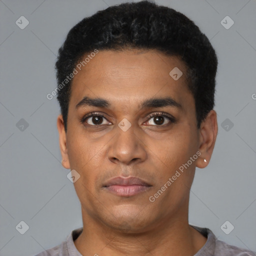 Neutral latino young-adult male with short  black hair and brown eyes