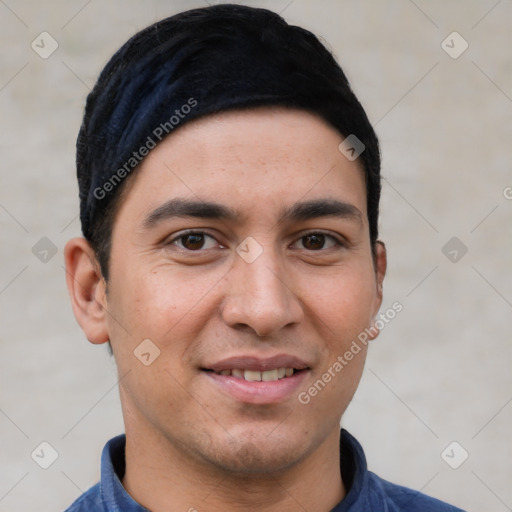 Joyful white young-adult male with short  black hair and brown eyes