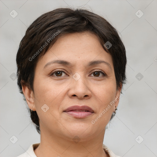 Joyful white adult female with short  brown hair and brown eyes