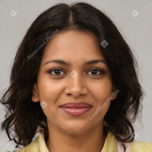 Joyful black young-adult female with medium  brown hair and brown eyes