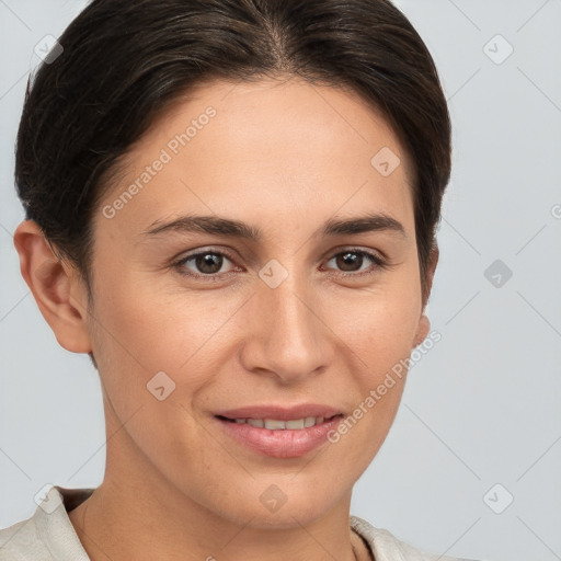 Joyful white young-adult female with short  brown hair and brown eyes