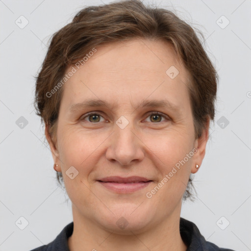 Joyful white adult female with short  brown hair and brown eyes