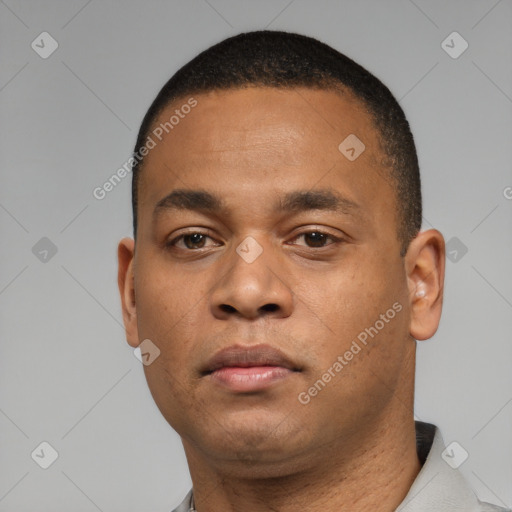 Neutral black young-adult male with short  black hair and brown eyes