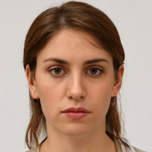 Neutral white young-adult female with medium  brown hair and grey eyes