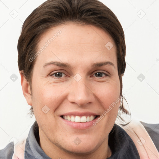 Joyful white young-adult female with short  brown hair and grey eyes