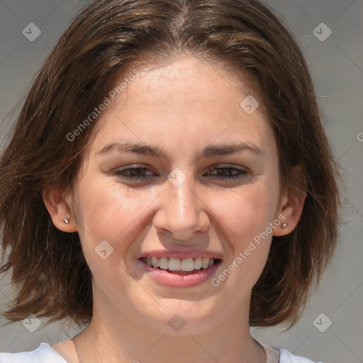 Joyful white young-adult female with medium  brown hair and blue eyes