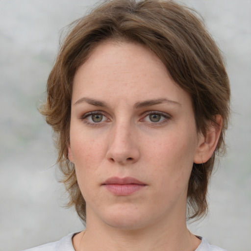 Neutral white young-adult female with medium  brown hair and brown eyes