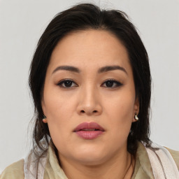 Neutral asian young-adult female with medium  brown hair and brown eyes