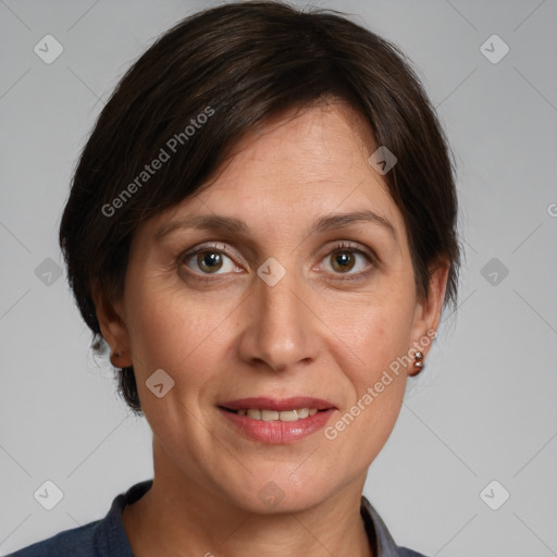 Joyful white adult female with medium  brown hair and grey eyes