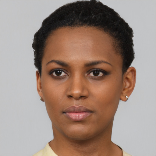 Neutral black young-adult female with short  black hair and brown eyes