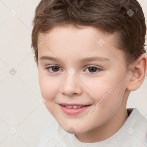 Joyful white child male with short  brown hair and brown eyes