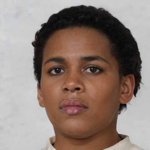 Neutral black young-adult female with short  brown hair and brown eyes