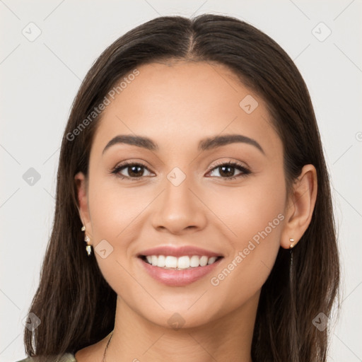 Joyful white young-adult female with long  brown hair and brown eyes