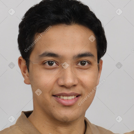 Joyful latino young-adult male with short  brown hair and brown eyes