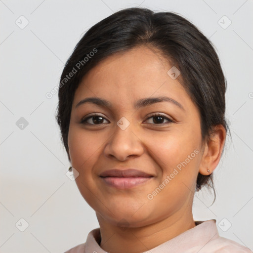 Joyful latino young-adult female with short  brown hair and brown eyes