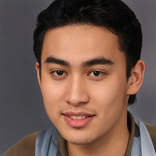 Joyful latino young-adult male with short  brown hair and brown eyes