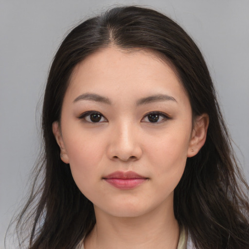 Neutral asian young-adult female with long  brown hair and brown eyes