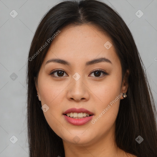 Joyful asian young-adult female with long  brown hair and brown eyes