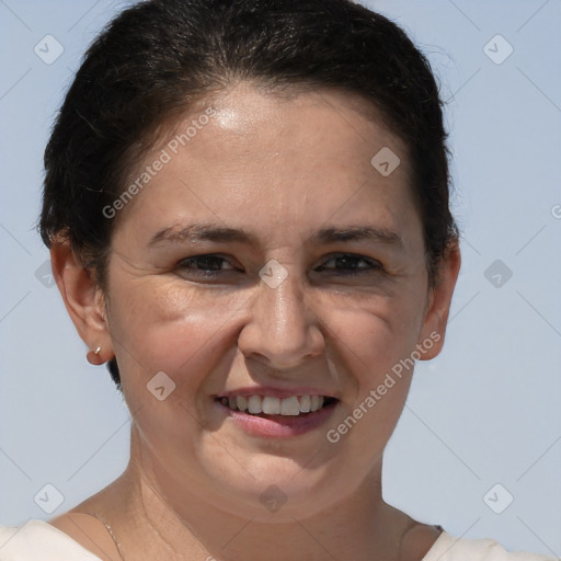 Joyful white adult female with short  brown hair and brown eyes