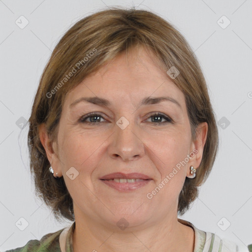 Joyful white adult female with medium  brown hair and brown eyes