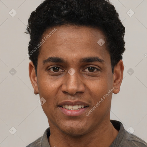 Joyful black young-adult male with short  black hair and brown eyes