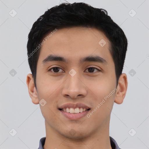 Joyful asian young-adult male with short  black hair and brown eyes