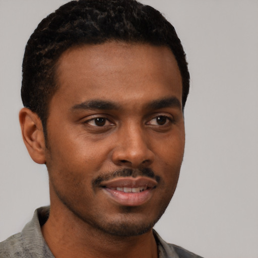 Neutral black young-adult male with short  brown hair and brown eyes