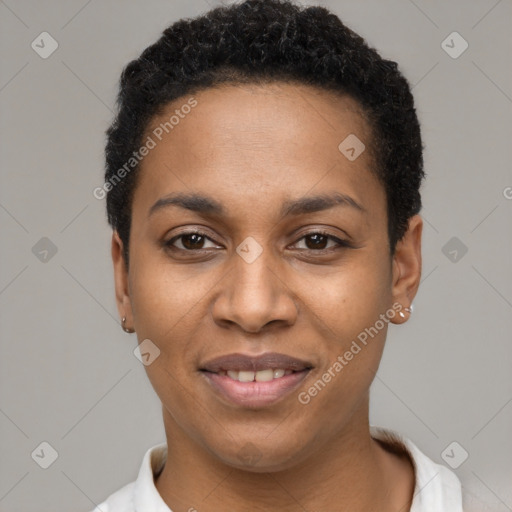 Joyful black young-adult female with short  black hair and brown eyes