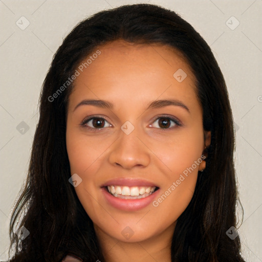 Joyful latino young-adult female with long  brown hair and brown eyes