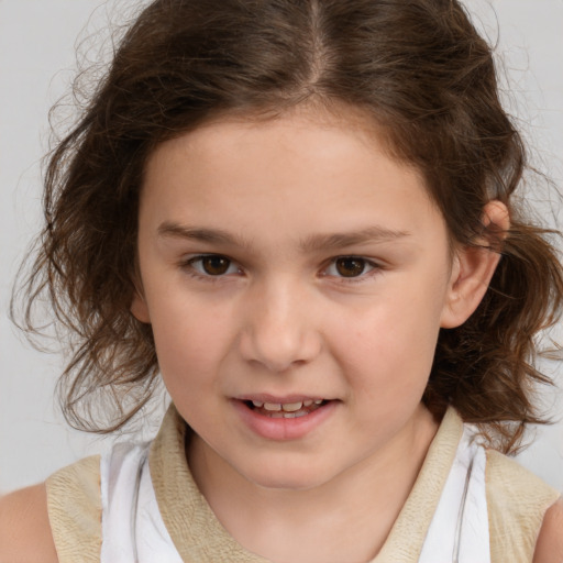 Joyful white child female with medium  brown hair and brown eyes