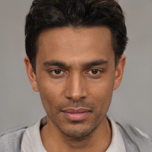 Neutral white young-adult male with short  black hair and brown eyes