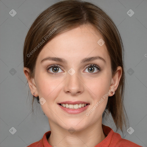 Joyful white young-adult female with medium  brown hair and blue eyes