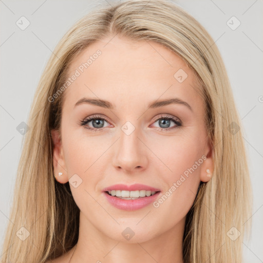 Joyful white young-adult female with long  brown hair and blue eyes