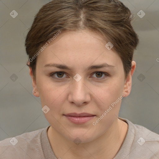 Joyful white young-adult female with short  brown hair and grey eyes