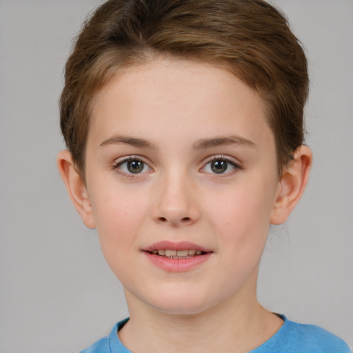 Joyful white child female with short  brown hair and brown eyes