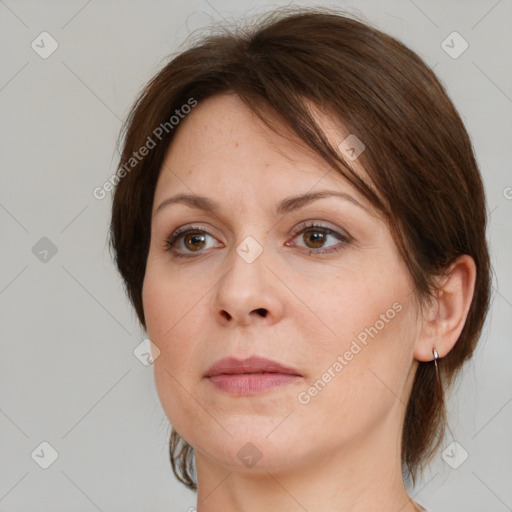 Neutral white young-adult female with medium  brown hair and brown eyes